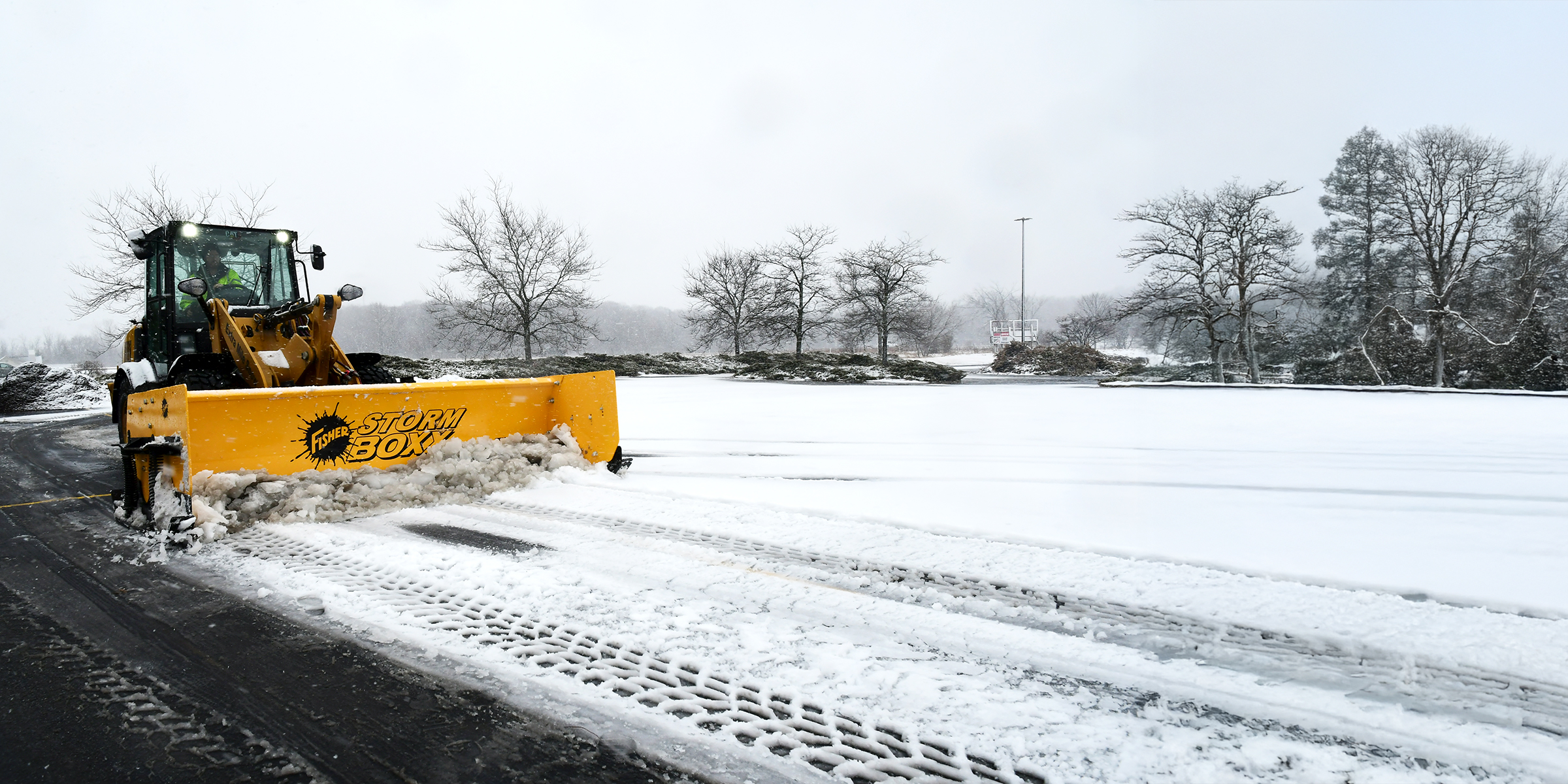 Fisher STORM BOXX™ TRACE™ Edge Technology FIXED-WING PUSHER PLOWS