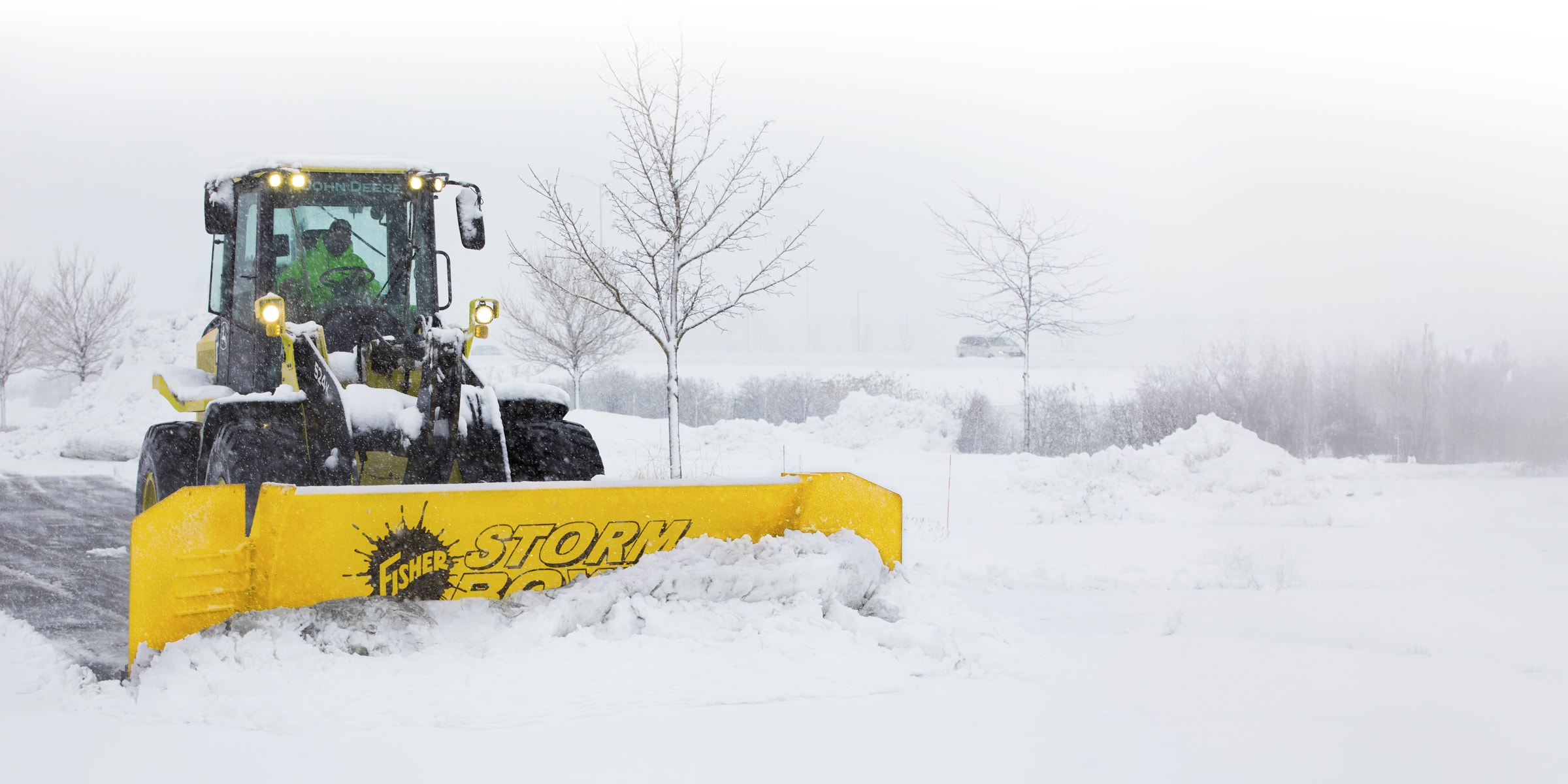 Fisher STORM BOXX™ HXTRACE™ EdgeTechnology Hydraulic-Wing Pusher Plows